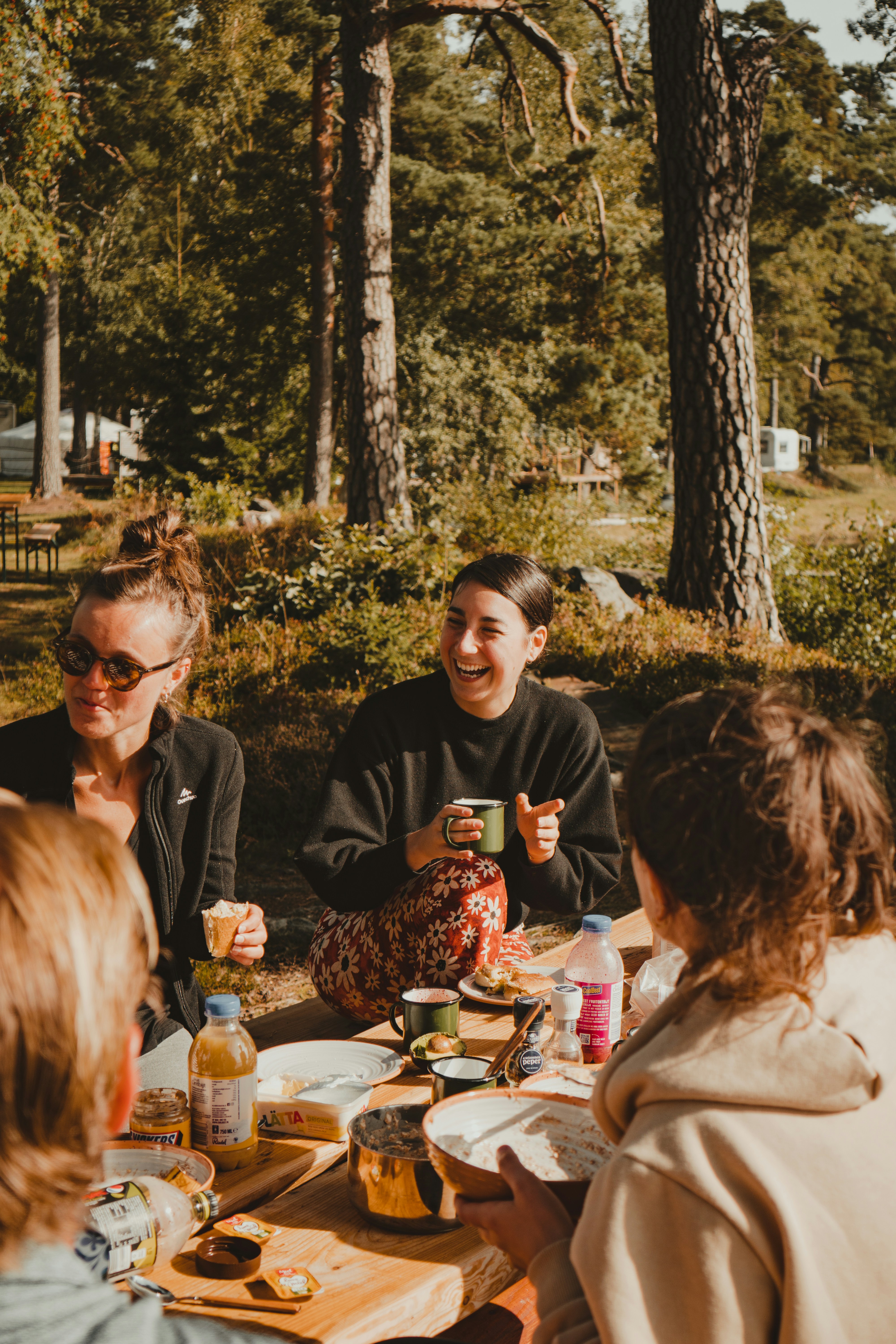 Sitting around table with family and friends